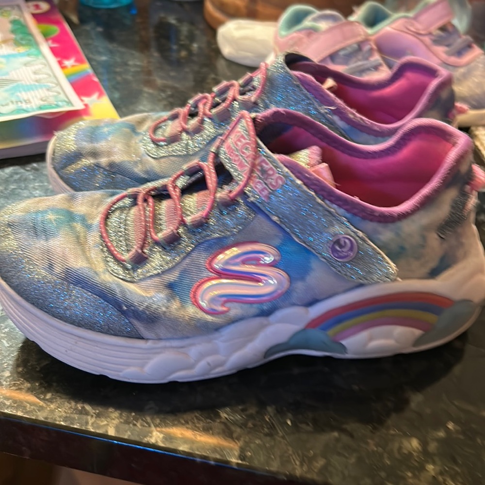 Sketchers cloud and Rainbow design and they light up on the rainbows! EUC